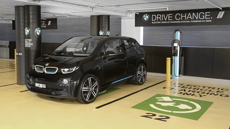 Black BMW electric car at a ChargePoint station