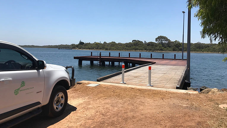 Western Australia project site featuring blue sky and water and vehicle