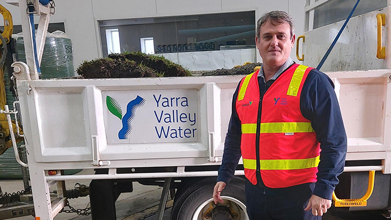 Jacques Britz pictured in front of Yarra Valley Water branded vehicle