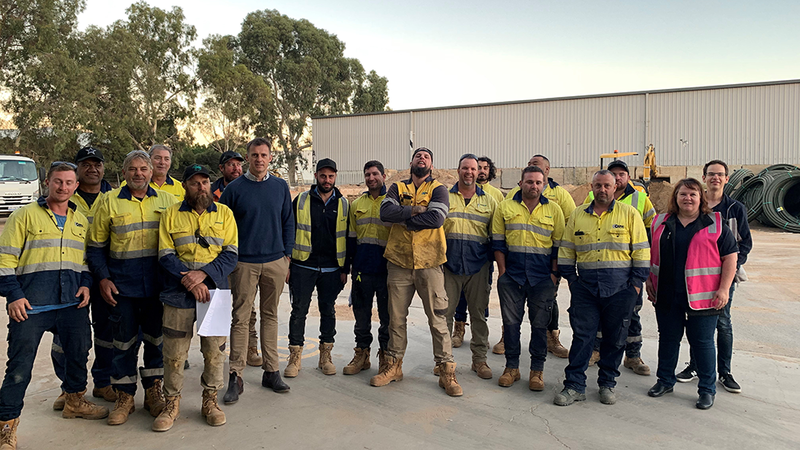The South Australian gas team standing in a car park