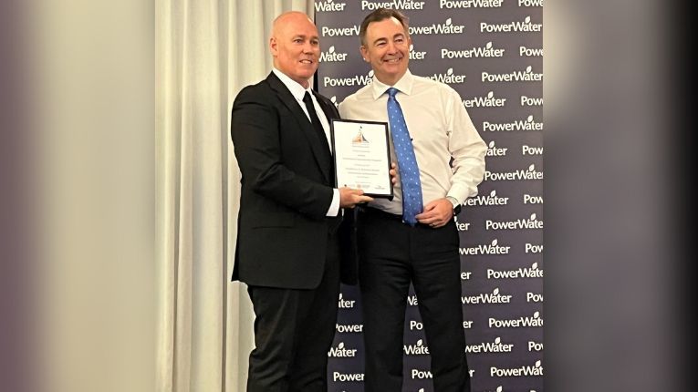 Stephen Densmore pictured with the award certificate 