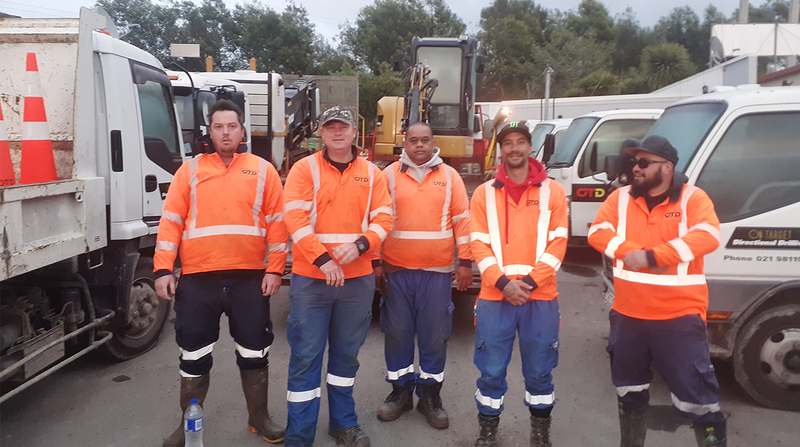 New Zealand telecommunications team pictured in high visibility attire at project site